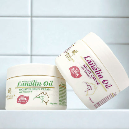 Two jars of Australian Lanolin Oil moisturizing cream on a white tiled background lanolin cream moisturiser