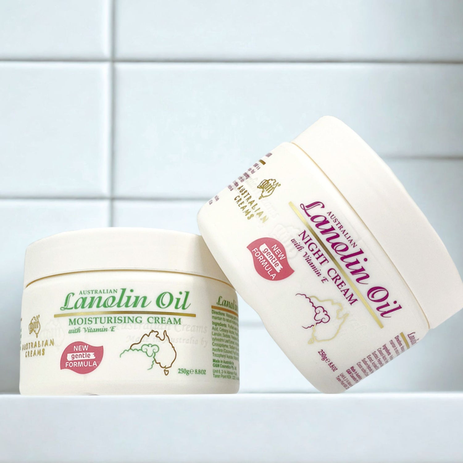 Two jars of Australian Lanolin Oil moisturizing cream on a white tiled background lanolin cream moisturiser
